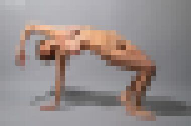 A nude middle-aged white woman with short blonde hair leaning her whole body back, supporting herself on her right arm and right leg with her left arm draped over her head, looking downward with a neutral expression